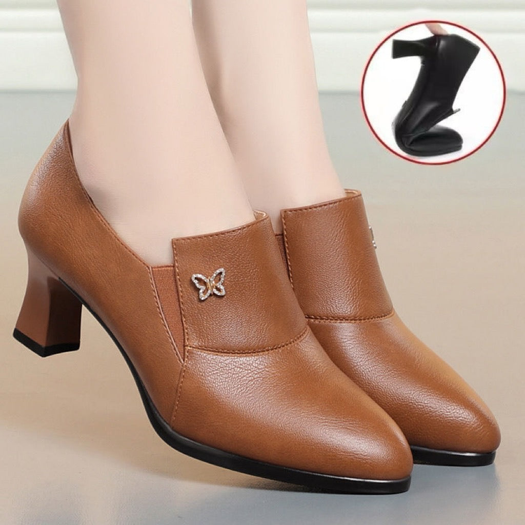 Tacones altos de mariposa