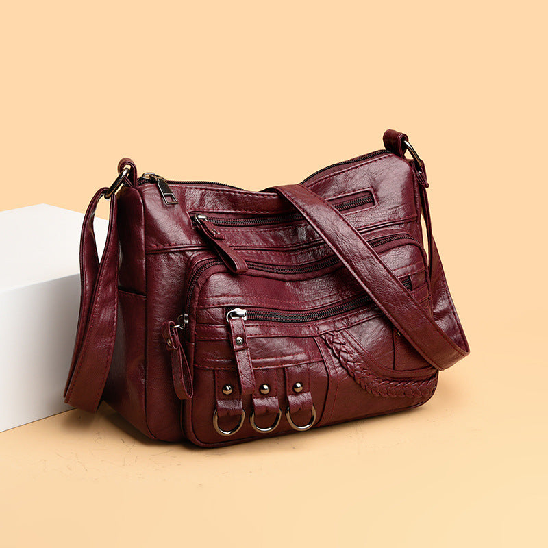 Bolso bandolera de gran capacidad con múltiples bolsillos