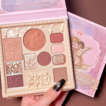 Paleta de sombras de ojos con ángel en relieve