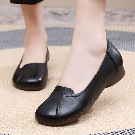 Zapatos cómodos de cuero con suela blanda y punta redonda