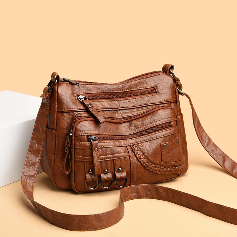 Bolso bandolera de gran capacidad con múltiples bolsillos