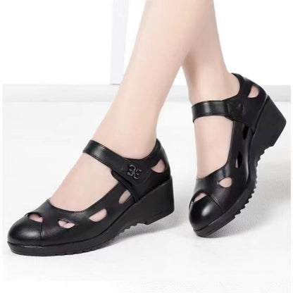 Zapatos de cuero huecos de suela blanda