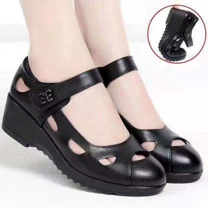 Zapatos de cuero huecos de suela blanda