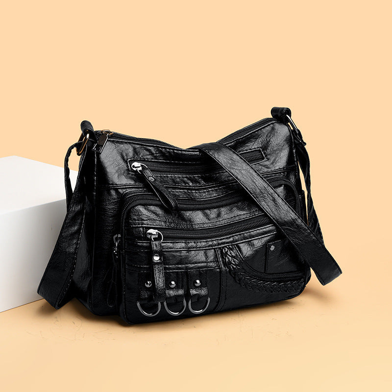 Bolso bandolera de gran capacidad con múltiples bolsillos