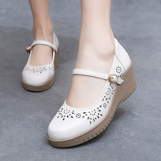 Nuevos zapatos de cuña con punta redonda