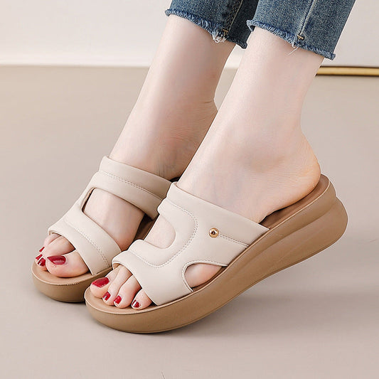 Sandalias de piel con cuña y suela blanda