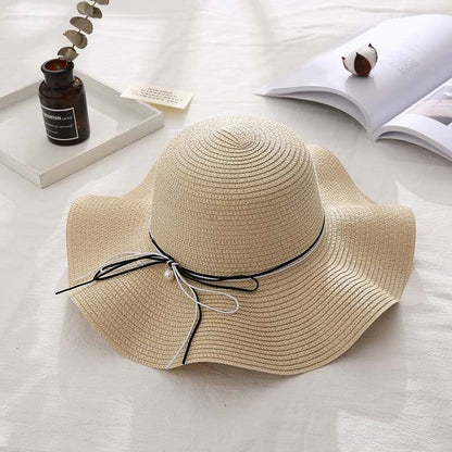 Sombrero de paja con cúpula de lazo plegable